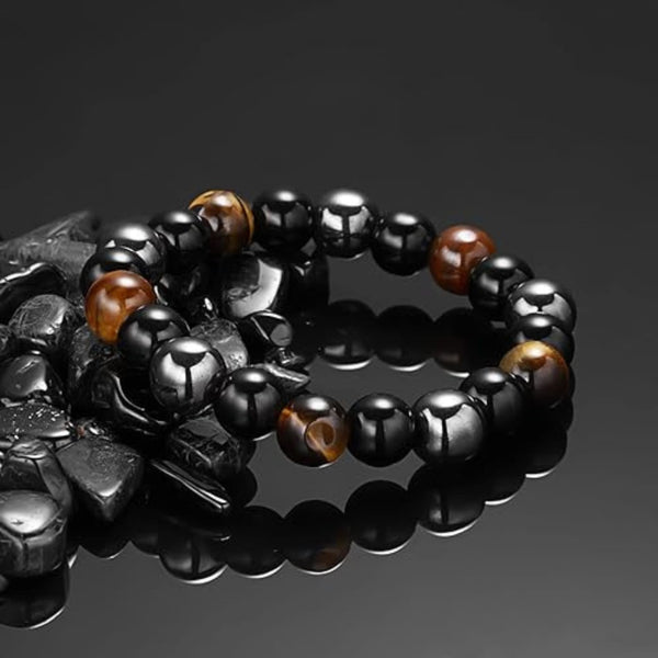 Close up of 8 mm beads showing Black Obsidian, Hematite and Tigers Eye on the Triple Protection Bracelet for nazar protection